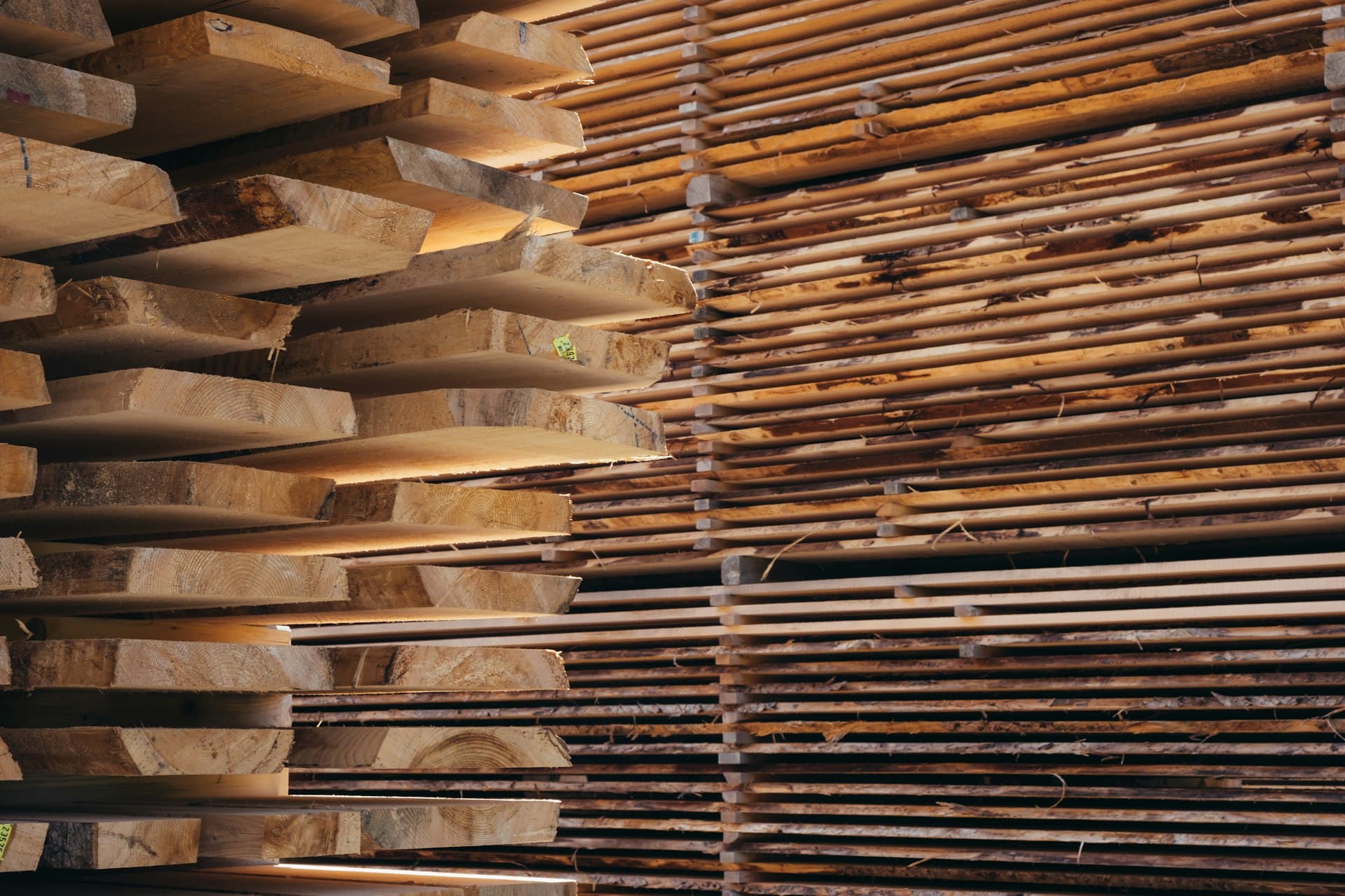 Stacked lumber at Norfeld Building Supply's yard